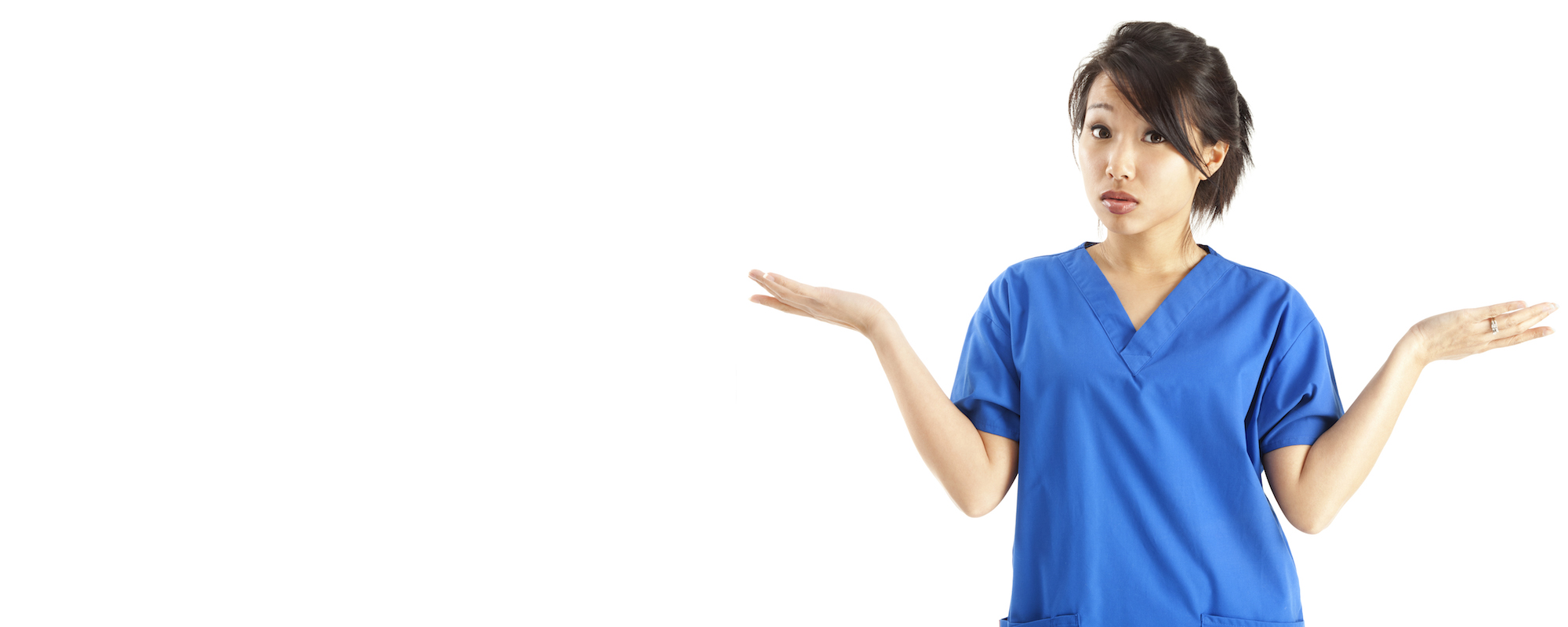 Young Asian Nurse in Blue Scrubs Shrugging